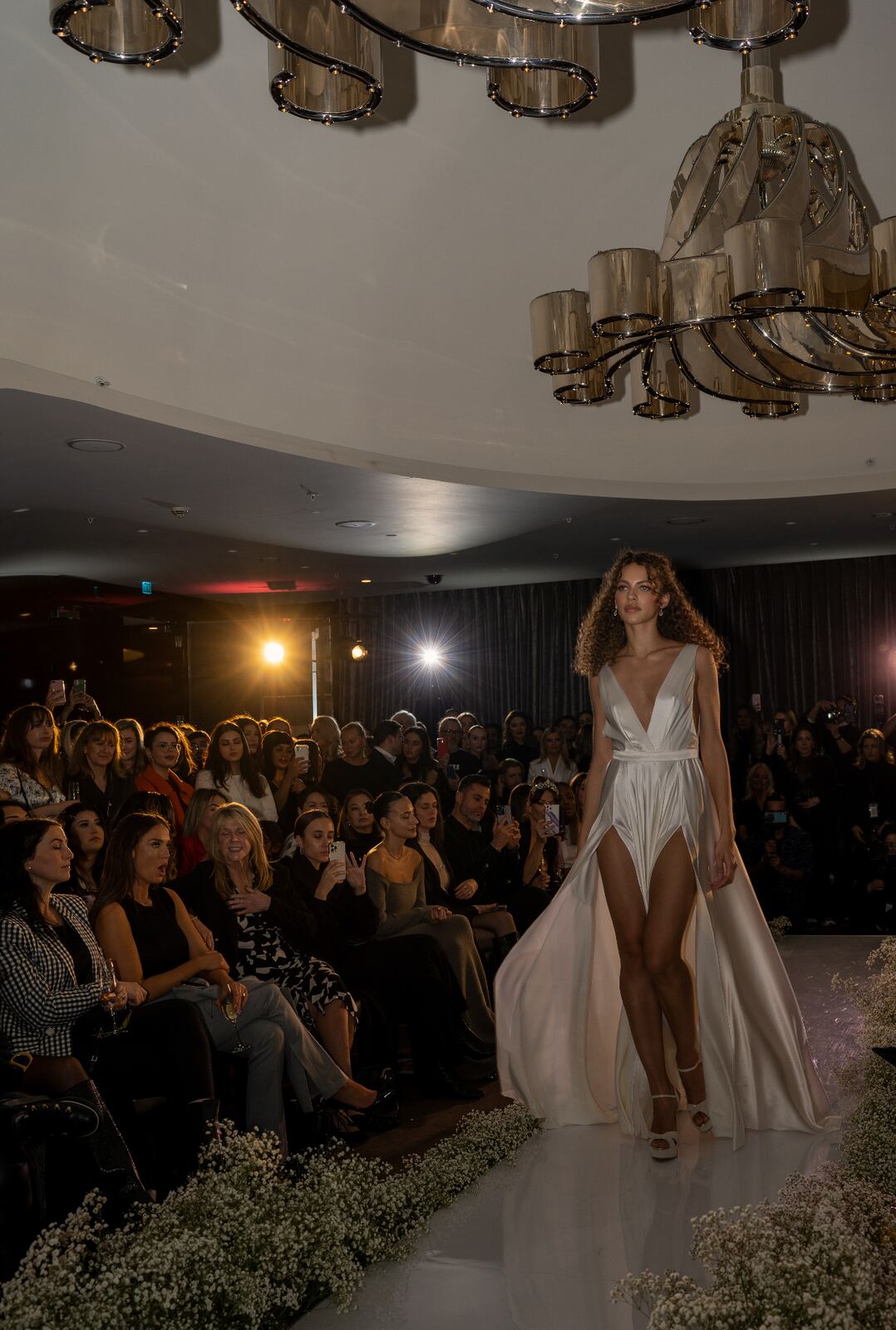 London Fashion Week runway model in ivory gown